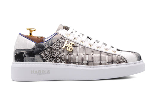 Sneakers in printed leather with a rubber sole.