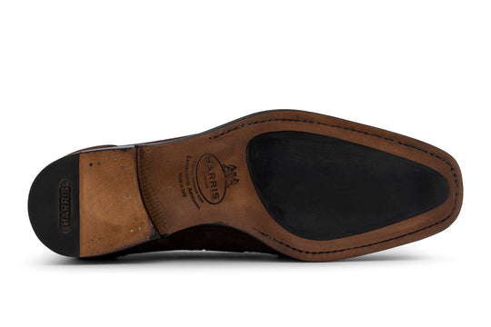 Moccasin with pom pom in hand-shaded suede