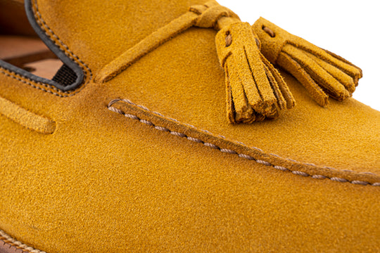 Mocassino in suede con pon pon