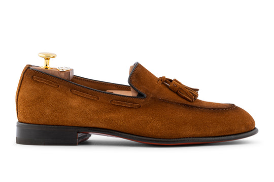 Mocassino in suede con pon pon