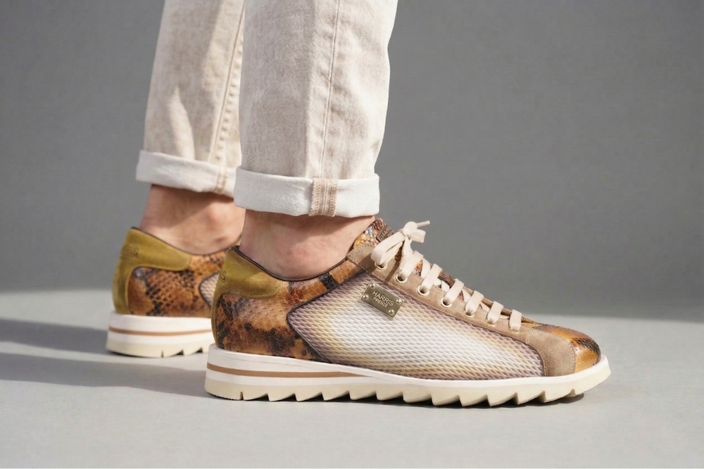 Sneakers effetto traforato e pitone