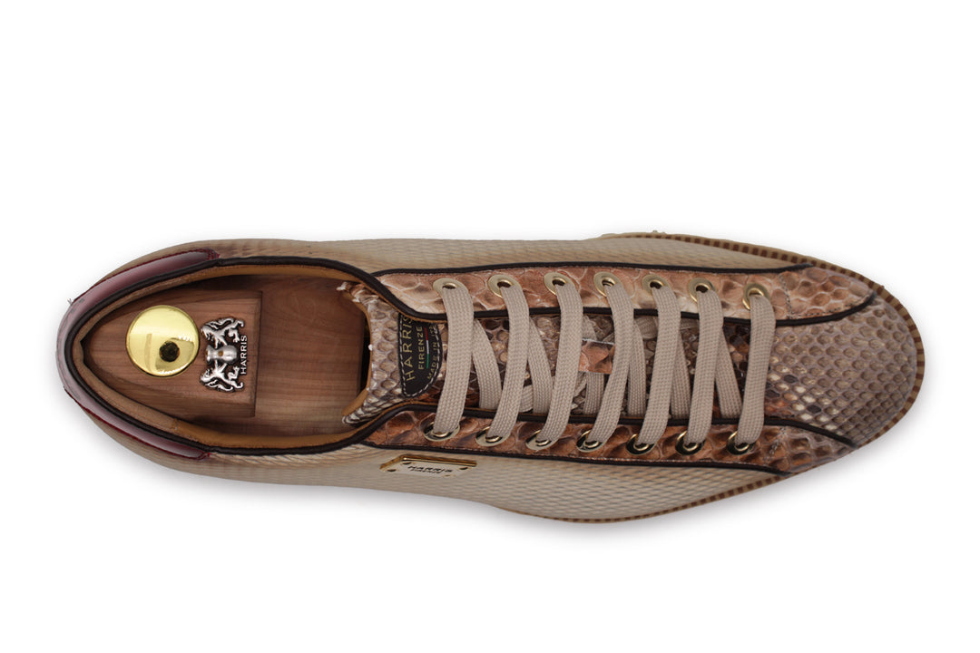 Sneakers in pitone ed effetto traforato