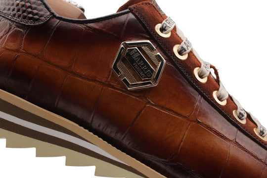 Zapatillas con efecto cocodrilo y ante.