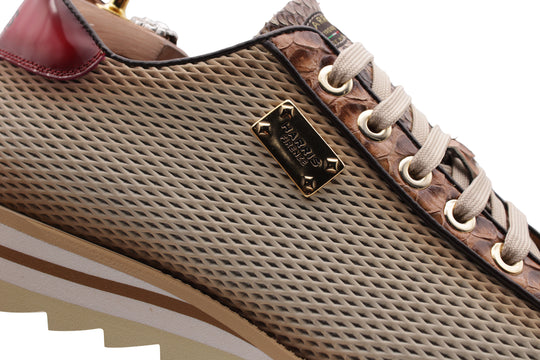 Sneakers in pitone ed effetto traforato