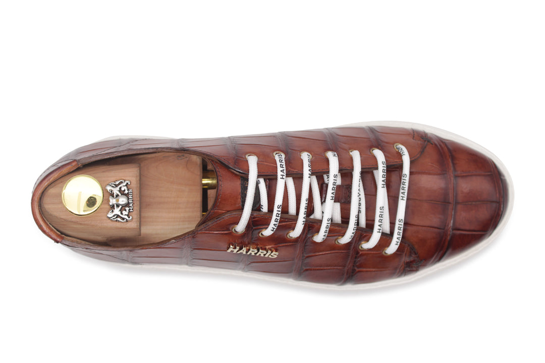 Sneakers in coccodrillo dipinte a mano