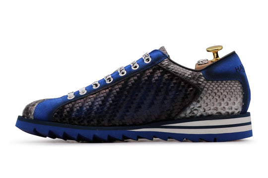 Sneaker in woven leather and python