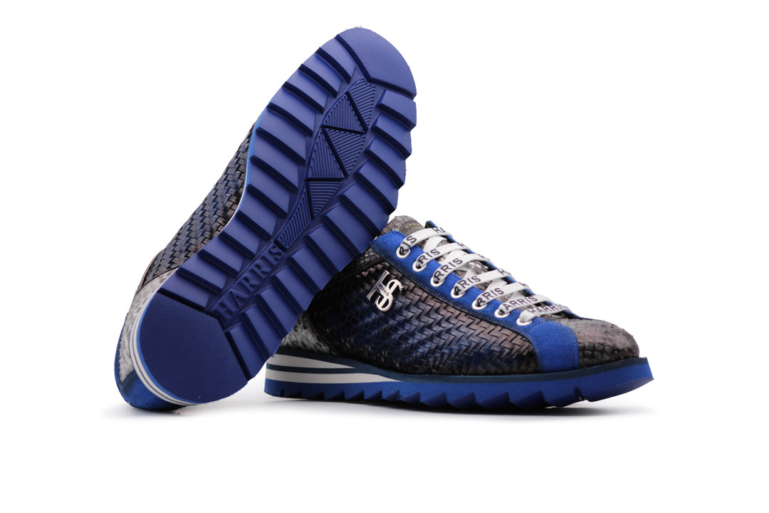 Sneaker in woven leather and python