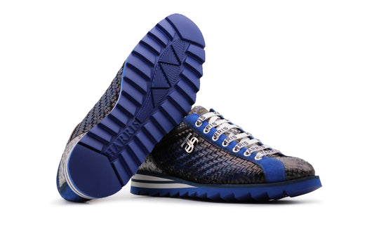 Sneaker in woven leather and python
