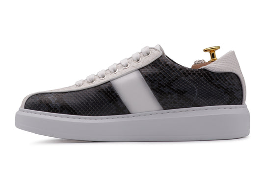 Sneakers in pelle di pitone e suola a cassetta
